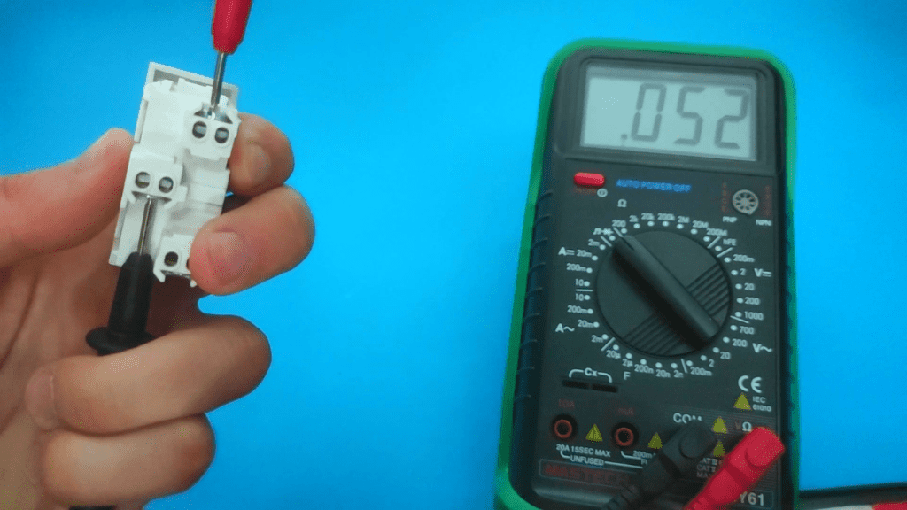 Place Multimeter Probes On Screw Terminals