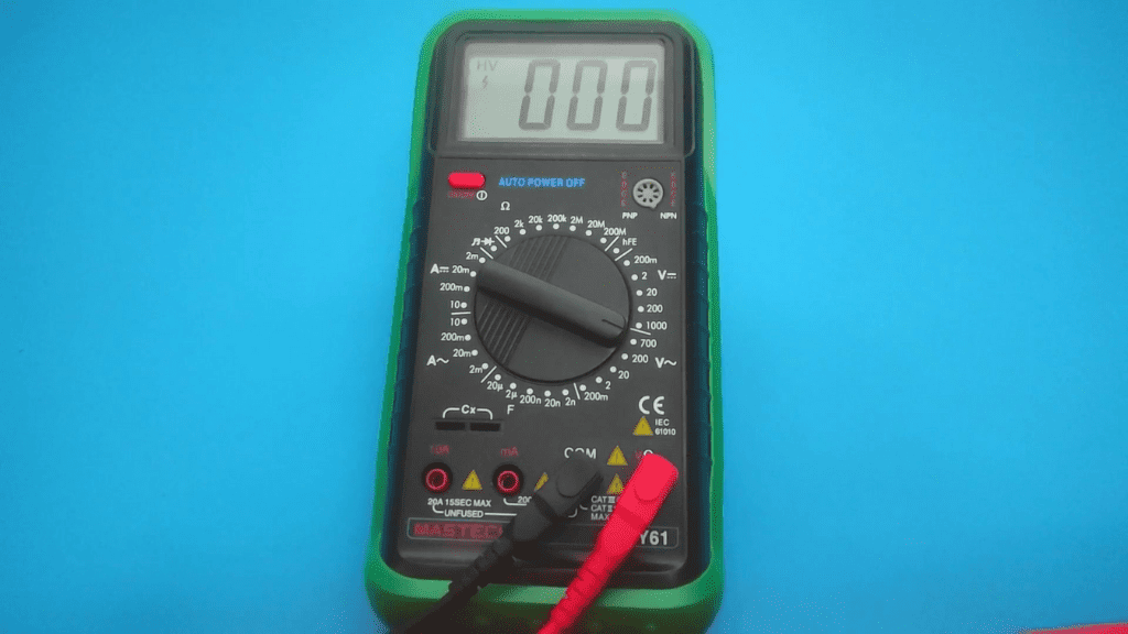 set multimeter dial to voltage