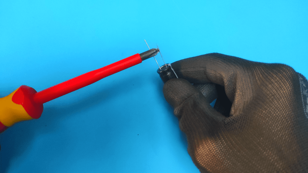 discharge capacitor with screwdriver